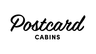 Postcard Cabins Signature Script Logo (PRNewsfoto/Postcard Cabins)