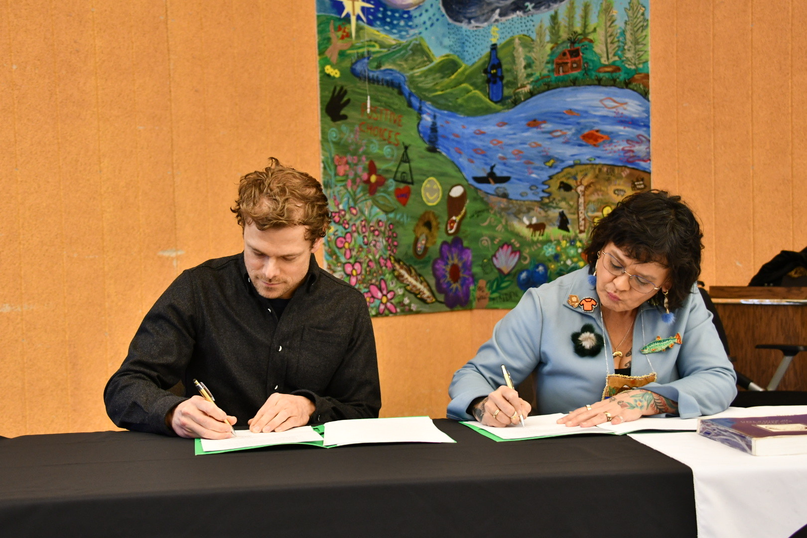 <span><i><strong>Figure 2</strong></i> - CEO & Director, Scott Berdahl and Chief Dawna Hope of the First Nation of Na-Cho Nyäk Dun, during the signing, reflecting the strong and collaborative relationship between Snowline and the First Nation of Na-Cho Nyäk Dun.</span>