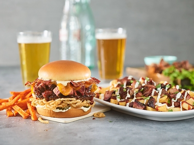 Part of the new-and-improved lineup of gourmet burgers, new entrées, appetizers & beverages at Red Robin, the BBQ Burnt Ends ‘N Bacon Burger comes with smoked burnt ends, crispy onion straws, Whiskey River® BBQ Sauce, melted cheddar, black-peppered bacon, pickles and mayo and the BBQ Burnt Ends Loaded Fries made with Red Robin’s signature Steak Fries loaded with smoked burnt ends, drizzled with house-made ranch and Whiskey River BBQ Sauce with a cilantro garnish are available for a limited time!