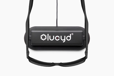 Lucyd glasses placed on the Dock to charge. Additional USB ports in the rear for multi-device charging. Photo courtesy of Innovative Eyewear Inc.