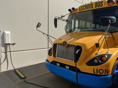 Nuvve PowerPort charging station with a Lion Electric Bus.
