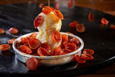 This April Fool's Day, BJ’s is offering the Sweet Heat Pepperoni Pizookie®, featuring its classic warm chocolate chunk cookie base topped with rich vanilla bean ice cream, crispy cup-and-char pepperoni, and a drizzle of Mike’s Hot Honey—available for one day only on April 1 for just $4.01. And no, this is not a joke.