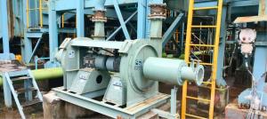 Centrifugal blower system installed on-site with motor and ducting in an industrial facility