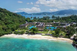 Aerial view of Phuket Marriott Resort & Spa, Merlin Beach with private beach, lagoon pools, and tropical surroundings.