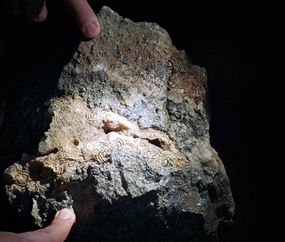 Jimenez and El Guadual show epithermal textures of symmetrical quartz banding and open space and bladed quartz. This later epithermal phase overprints two earlier phases of mesothermal mineralization and may explain the relatively higher-grade gold and enriched silver in this area. (CNW Group/Outcrop Silver & Gold Corporation)